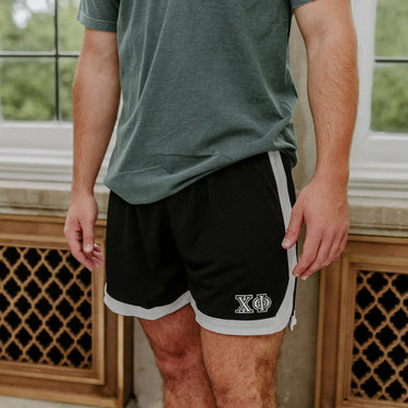 Chi Phi Fraternity Black 7" Mesh Shorts with Greek letters.