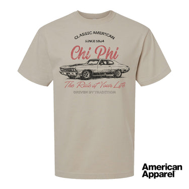 Beige T-shirt displayed on a plain background with a vintage-inspired graphic of a classic muscle car, mixed typography, and a soft red and black print design.